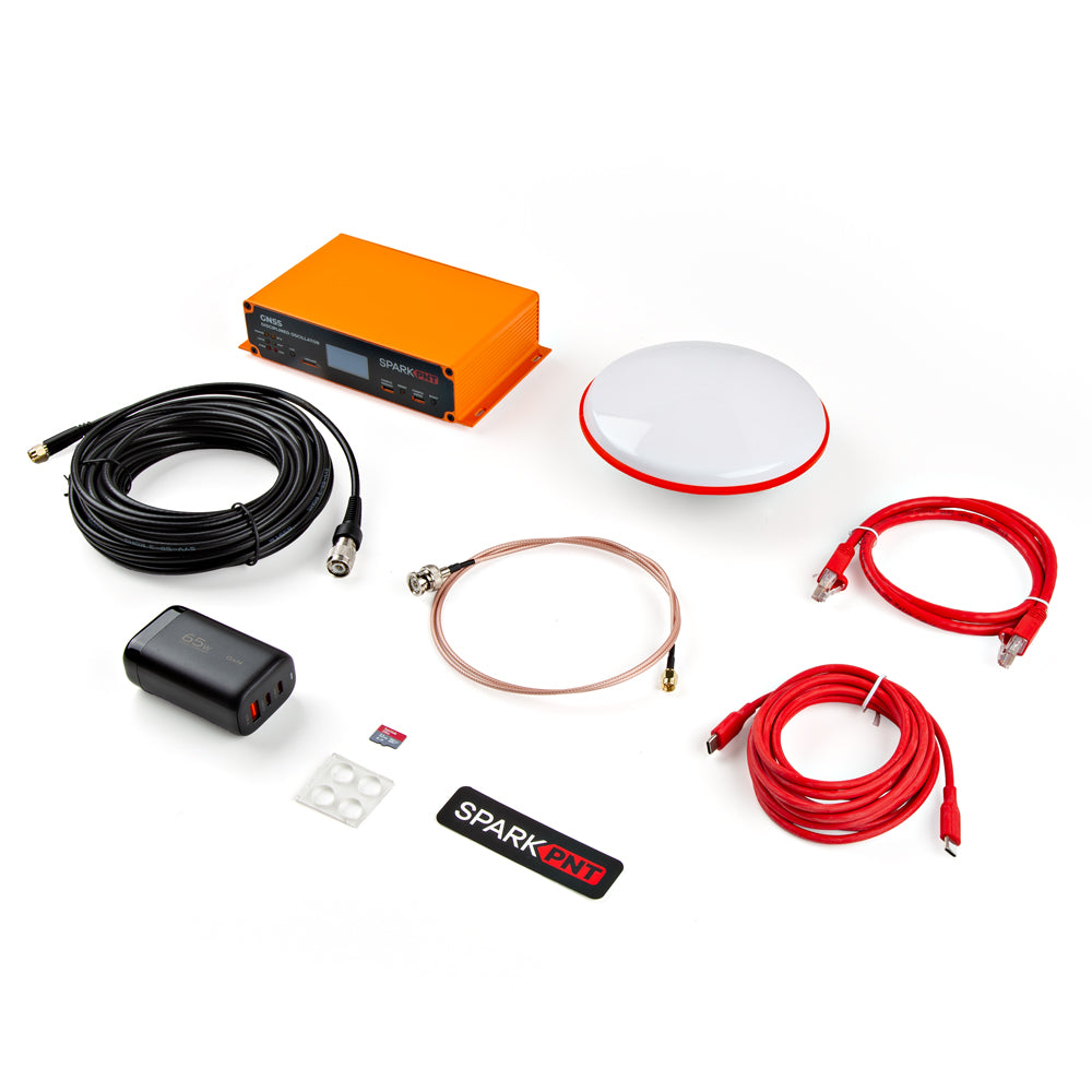 Collection of everything included with the GNSSDO including cables, battery charger, microSD card and more.